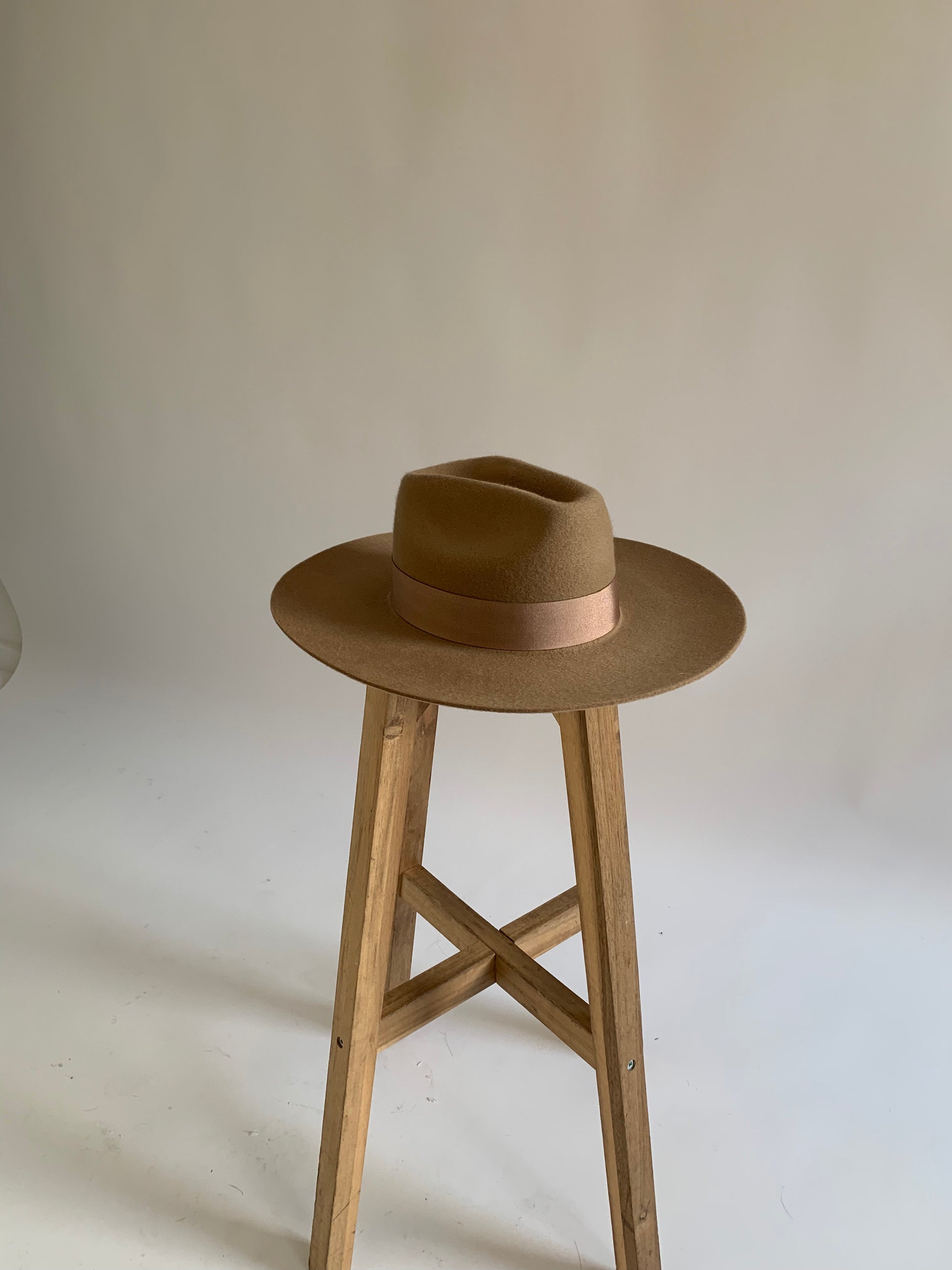 NAU our classic fedora hat  Shown here in shade Teak with ribbon trim  100% wool